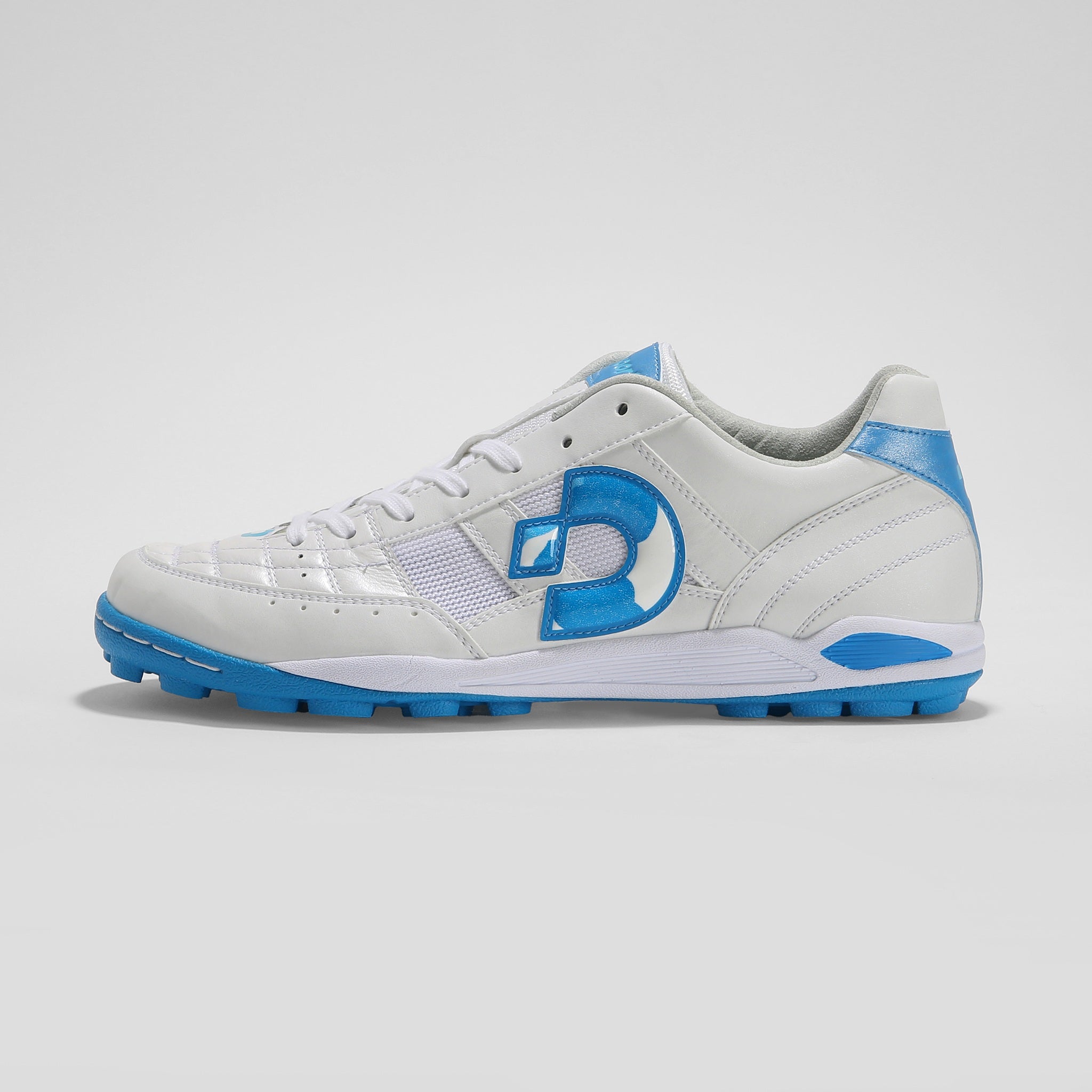 Desporte Rio KT2 white turf soccer boot with turquoise logo and sole