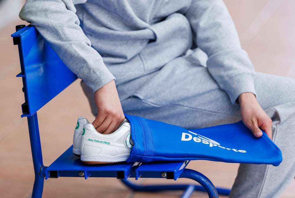 Desporte white futsal shoes and blue shoe bag